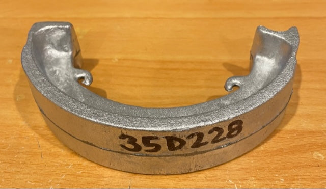 35D228 BRAKE SHOE CASTING (NEEDS FINISHING AND LINING)